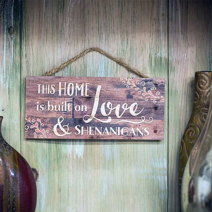 This Home is Built on Love and Shenanigans Distressed Wood Plank Sign