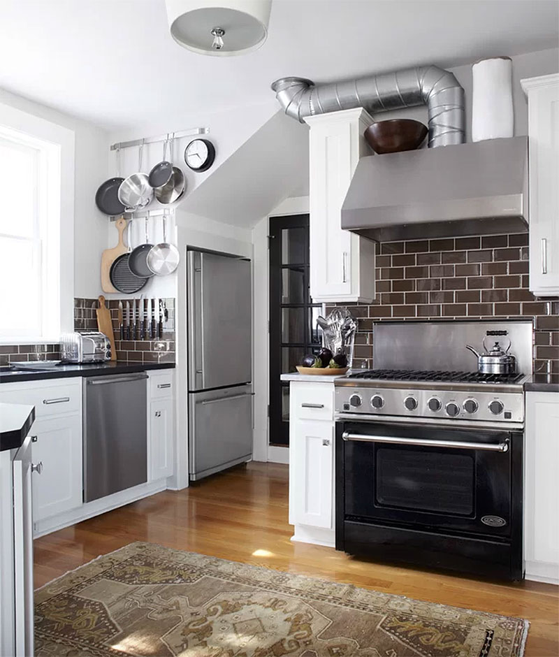 Exposed Pipe & Faux Brick Kitchen