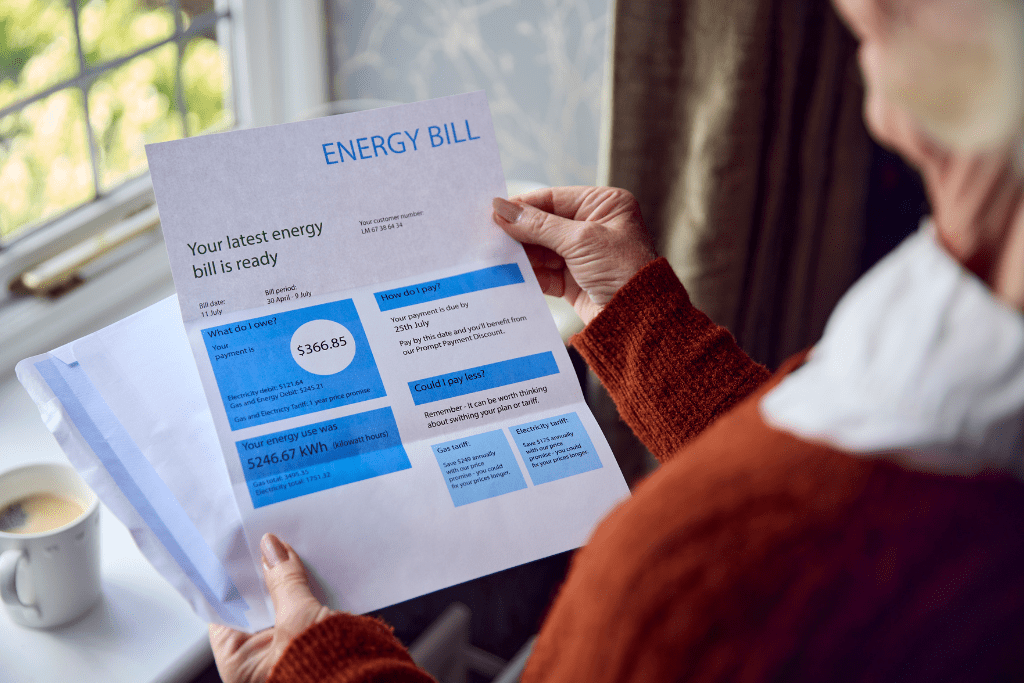 an image of a woman opening her energy bill